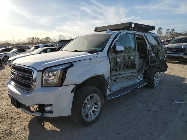 GMC YUKON SLT 2016 with VIN 1GKS2BKC2GR303281 - Photo from auction