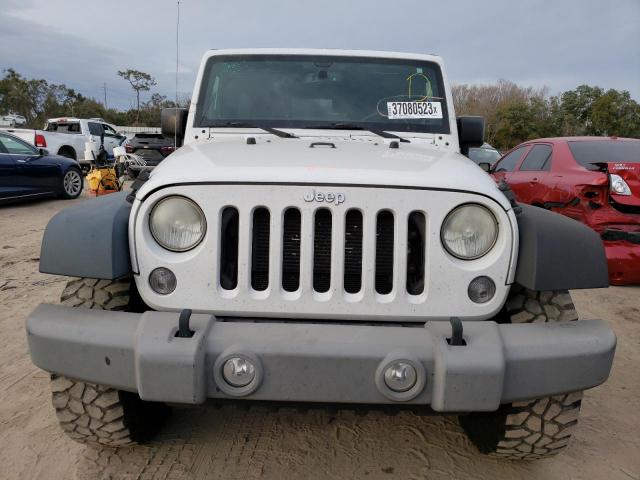 Photo 5 from auction – 2014 JEEP WRANGLER U with VIN 1C4BJWDG1EL269209
