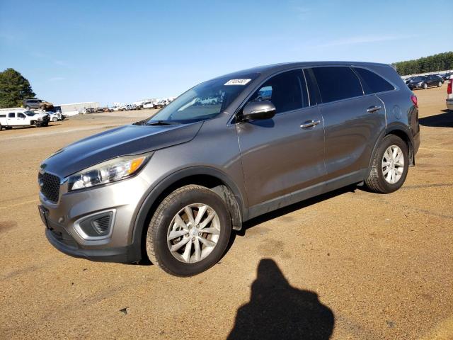 KIA SORENTO LX 2016 with VIN 5XYPG4A32GG018904 - Photo from auction