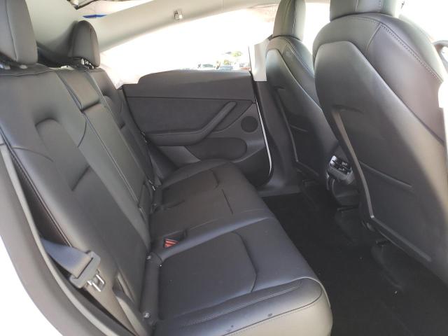 Photo 11 from auction – 2022 TESLA MODEL Y with VIN 7SAYGDEE8NF431272