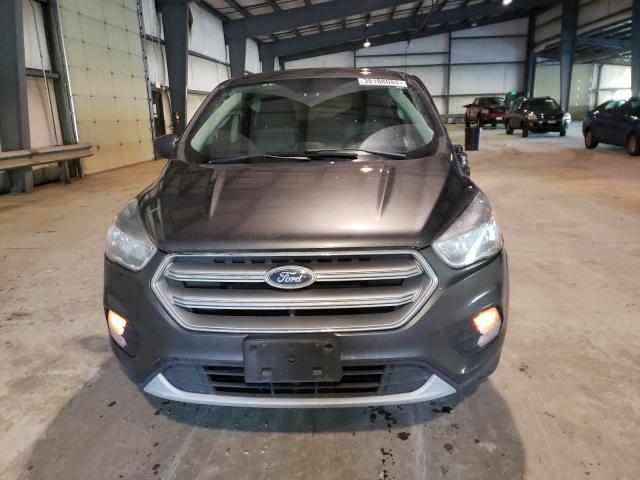 Photo 5 from auction – 2017 FORD ESCAPE SE with VIN 1FMCU9GD7HUC04423