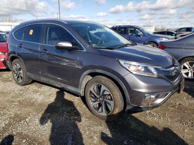 Photo 4 from auction – 2016 HONDA CR-V TOURI with VIN 5J6RM3H91GL025377