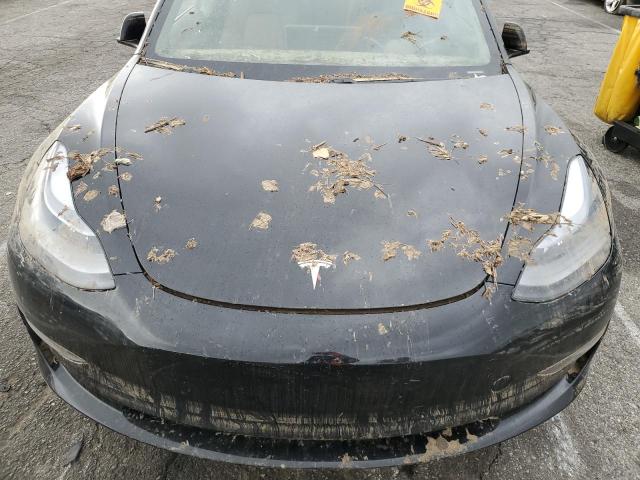 Photo 11 from auction – 2021 TESLA MODEL 3 with VIN 5YJ3E1EB1MF995278