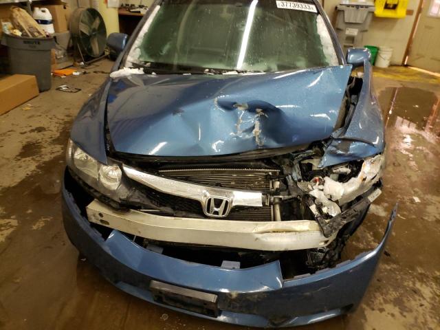 Photo 11 from auction – 2011 HONDA CIVIC LX with VIN 19XFA1F58BE038893