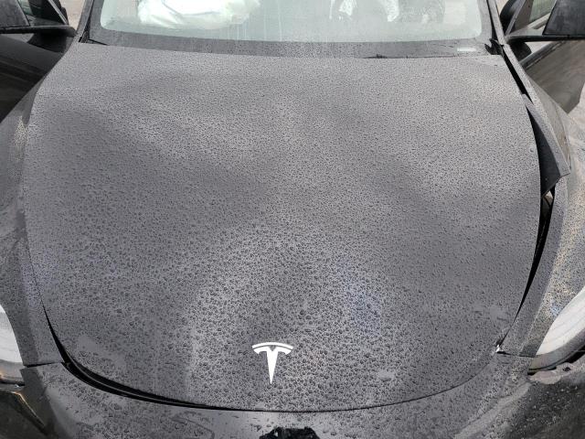 Photo 11 from auction – 2022 TESLA MODEL Y with VIN 7SAYGDEF8NF487818