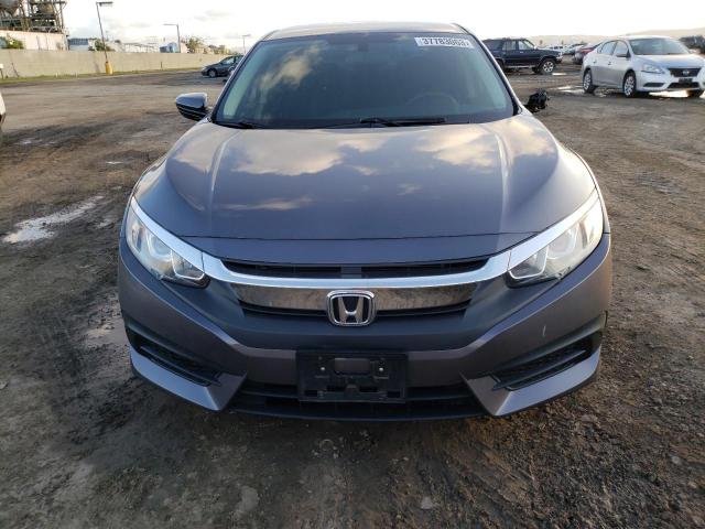 Photo 5 from auction – 2018 HONDA CIVIC LX with VIN 2HGFC2E54JH563391
