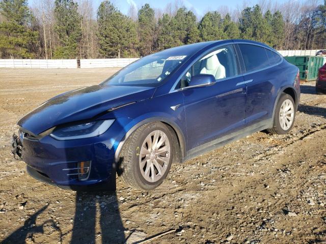 TESLA MODEL X 2017 with VIN 5YJXCBE22HF067787 - Photo from auction