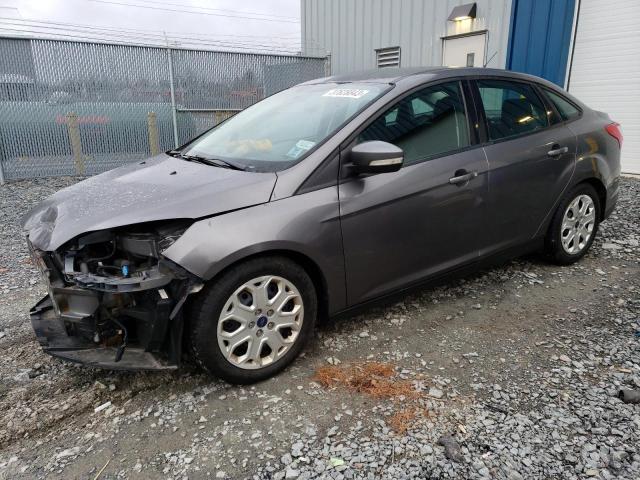 FORD FOCUS SE 2014 with VIN 1FADP3F26EL242696 - Photo from auction