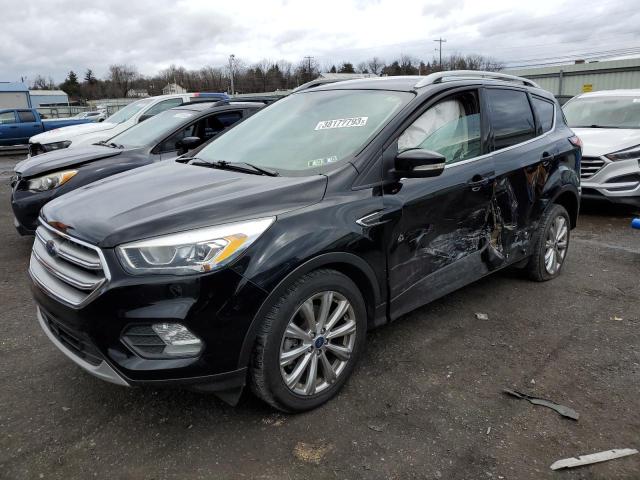 FORD ESCAPE TIT 2017 with VIN 1FMCU9J93HUC83397 - Photo from auction