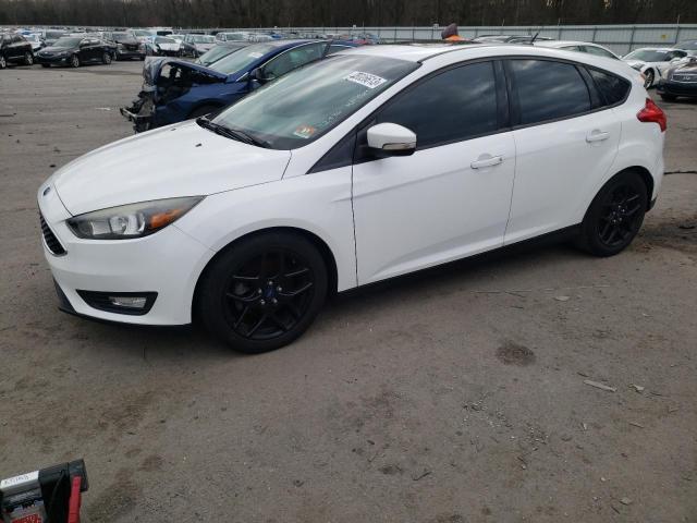 FORD FOCUS SE 2016 with VIN 1FADP3K24GL205512 - Photo from auction