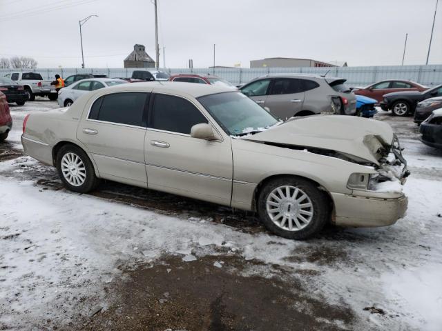 Photo 4 from auction – 2004 LINCOLN TOWN CAR E with VIN 1LNHM81W24Y677417
