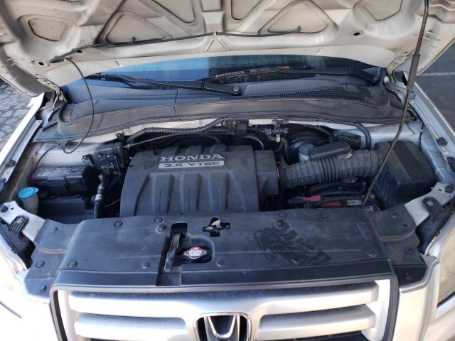 Photo 11 from auction – 2007 HONDA PILOT LX with VIN 2HKYF18137H530335