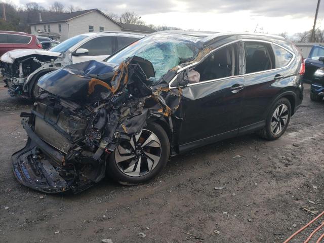 HONDA CR-V TOURI 2016 with VIN 5J6RM4H98GL075411 - Photo from auction