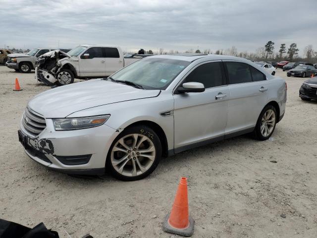 FORD TAURUS SEL 2013 with VIN 1FAHP2E8XDG220970 - Photo from auction