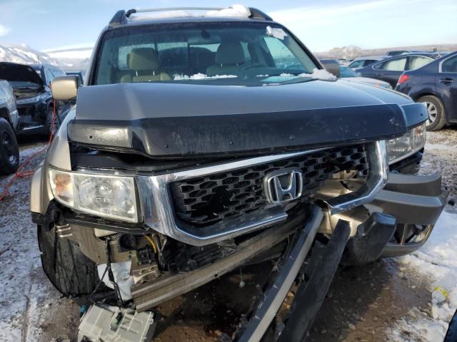 Photo 5 from auction – 2011 HONDA RIDGELINE with VIN 5FPYK1F5XBB003943