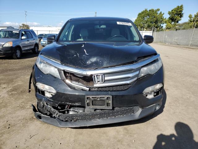 Photo 5 from auction – 2016 HONDA PILOT EXL with VIN 5FNYF5H53GB013142