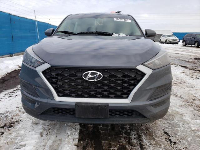Photo 5 from auction – 2019 HYUNDAI TUCSON SE with VIN KM8J2CA44KU990725