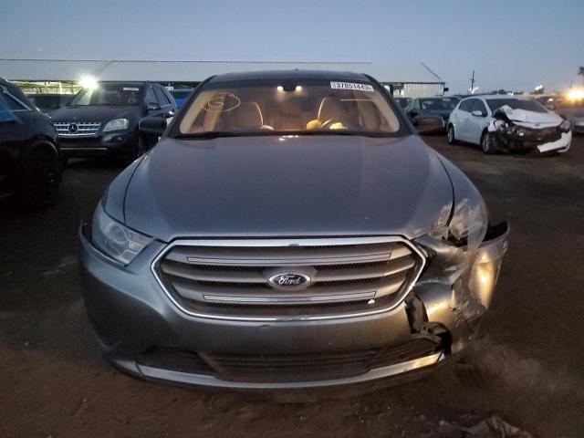 Photo 5 from auction – 2014 FORD TAURUS SE with VIN 1FAHP2D85EG117698
