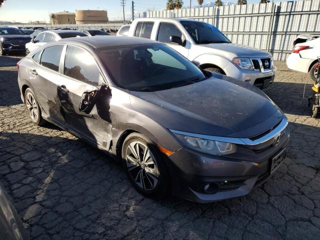 Photo 4 from auction – 2016 HONDA CIVIC EX with VIN 2HGFC1F3XGH659008