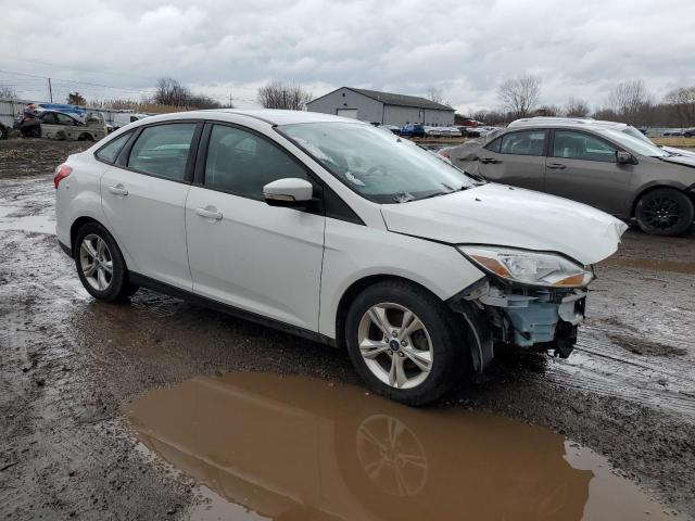 Foto 4 de la subasta – 2013 FORD FOCUS SE con VIN 1FADP3F20DL208607