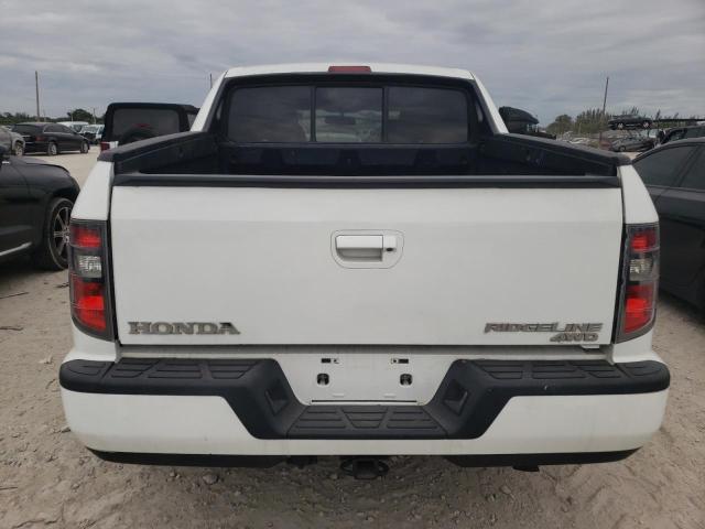 Photo 6 from auction – 2014 HONDA RIDGELINE with VIN 5FPYK1F55EB001344