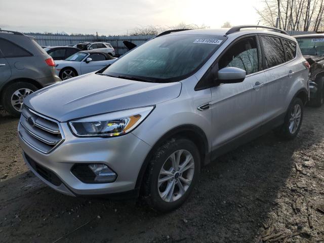 FORD ESCAPE SE 2018 with VIN 1FMCU9GD4JUB41044 - Photo from auction