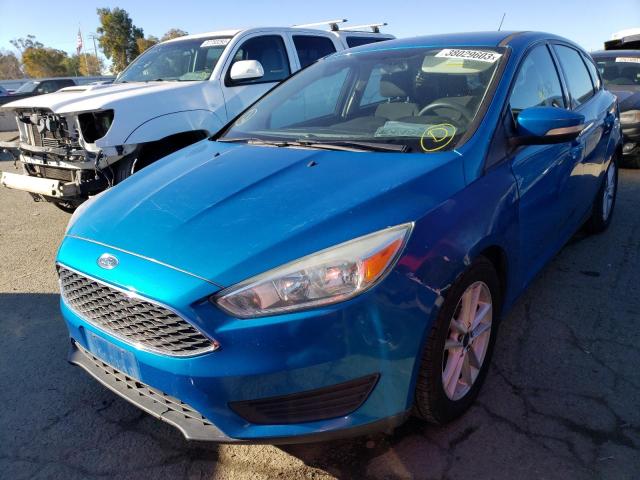 FORD FOCUS SE 2015 with VIN 1FADP3K21FL282417 - Photo from auction