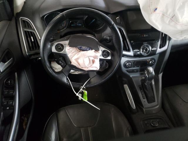 Photo 8 from auction – 2013 FORD FOCUS TITA with VIN 1FADP3J23DL270932