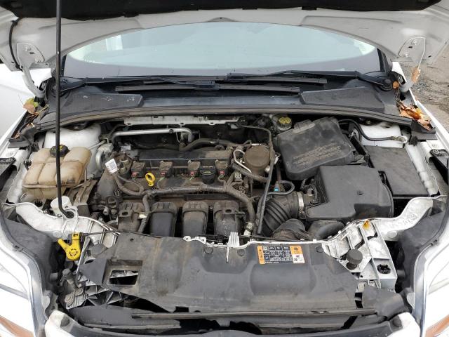 Photo 11 from auction – 2014 FORD FOCUS S with VIN 1FADP3E28EL375932