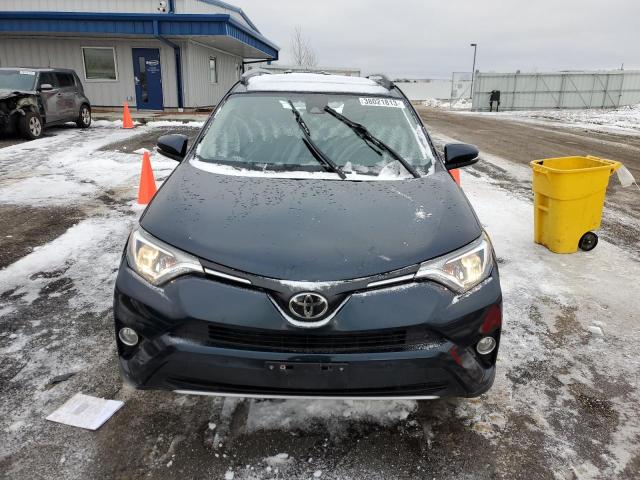 Photo 5 from auction – 2017 TOYOTA RAV4 XLE with VIN JTMRFREV6HD211996