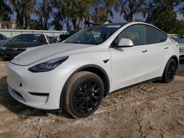 TESLA MODEL Y 2020 with VIN 5YJYGDEF9LF002841 - Photo from auction