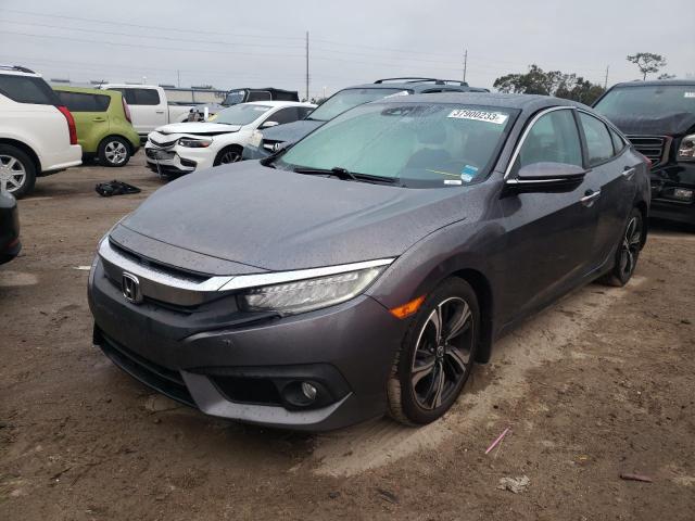 HONDA CIVIC TOUR 2017 with VIN 19XFC1F96HE203992 - Photo from auction
