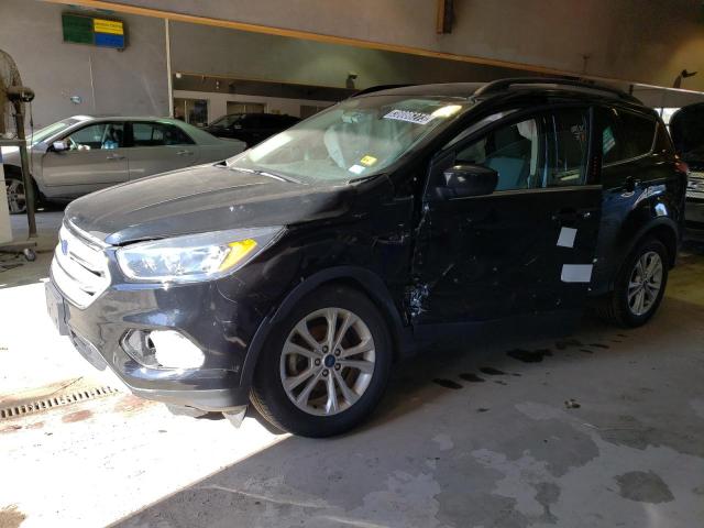 FORD ESCAPE SE 2018 with VIN 1FMCU0GD5JUC98660 - Photo from auction