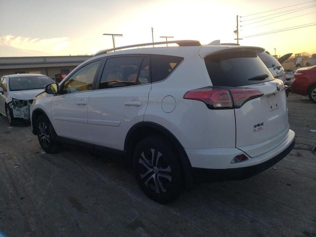 Photo 2 from auction – 2017 TOYOTA RAV4 LE with VIN JTMZFREV8HD099413