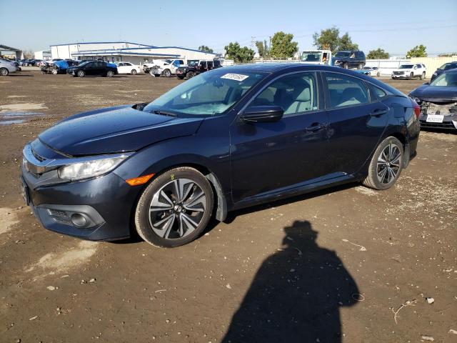 HONDA CIVIC EX 2017 with VIN 2HGFC1F33HH636560 - Photo from auction