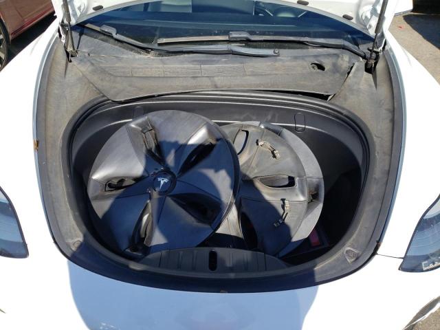 Photo 11 from auction – 2018 TESLA MODEL 3 with VIN 5YJ3E1EA4JF098801