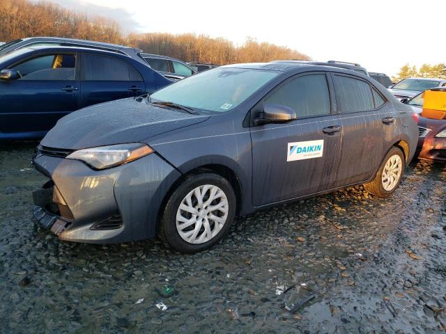 TOYOTA COROLLA L 2018 with VIN 5YFBURHE0JP775049 - Photo from auction