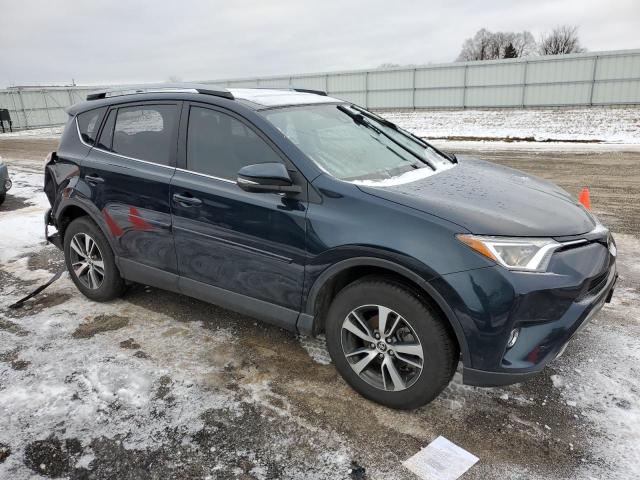 Photo 4 from auction – 2017 TOYOTA RAV4 XLE with VIN JTMRFREV6HD211996