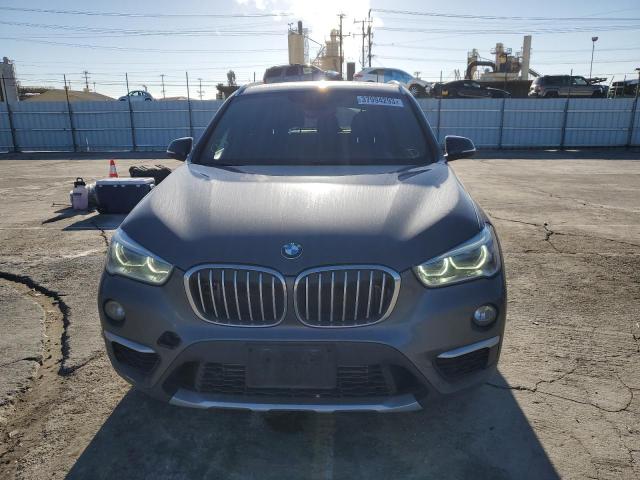Photo 5 from auction – 2016 BMW X1 XDRIVE2 with VIN WBXHT3Z3XG4A47554