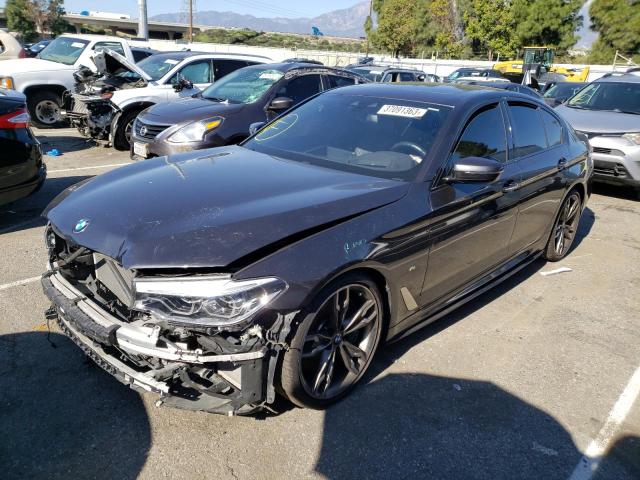 BMW M550XI 2018 with VIN WBAJB9C51JB049916 - Photo from auction