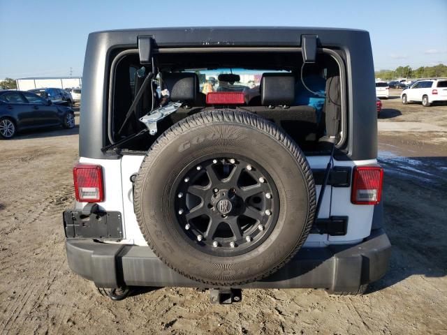 Photo 6 from auction – 2015 JEEP WRANGLER S with VIN 1C4AJWAG0FL523011