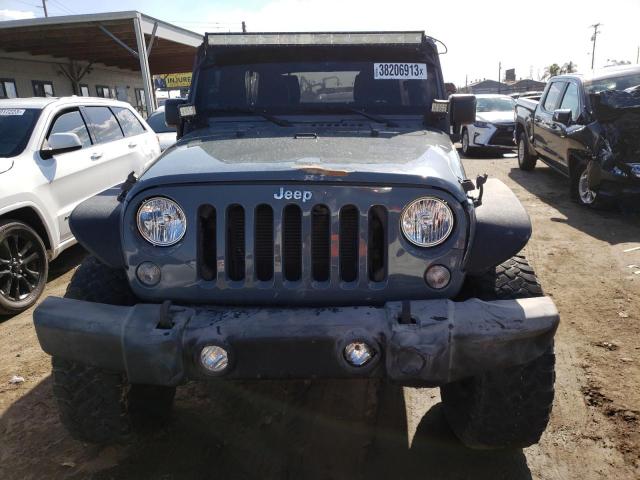 Photo 5 from auction – 2015 JEEP WRANGLER U with VIN 1C4BJWFG0FL636700