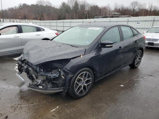 FORD FOCUS SEL 2017 with VIN 1FADP3H21HL306936 - Photo from auction