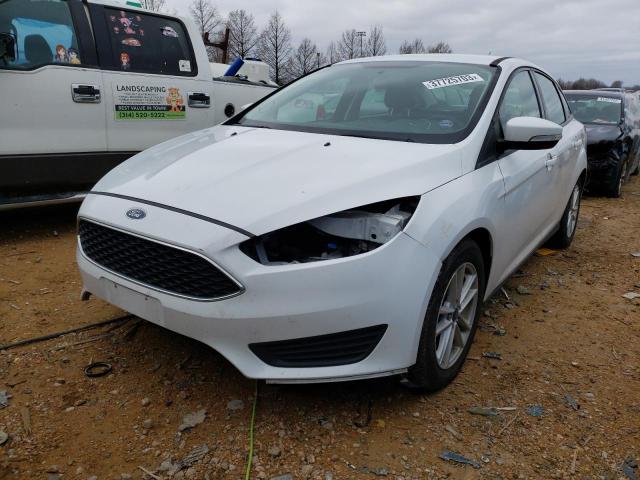 FORD FOCUS SE 2017 with VIN 1FADP3F20HL313203 - Photo from auction