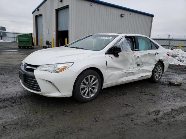TOYOTA CAMRY LE 2016 with VIN 4T1BF1FK7GU603449 - Photo from auction