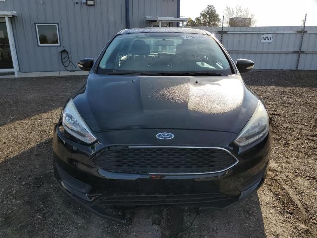 Photo 5 from auction – 2016 FORD FOCUS SE with VIN 1FADP3K20GL313397