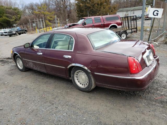 Photo 2 from auction – 2001 LINCOLN TOWN CAR E with VIN 1LNHM81W61Y688559