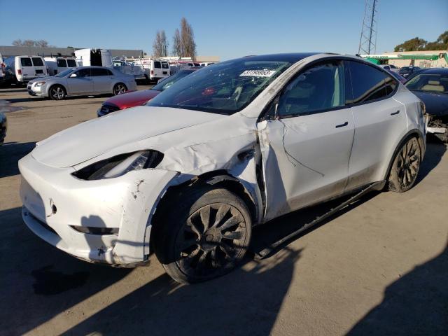 TESLA MODEL Y 2021 с VIN 5YJYGAEE8MF150941 - Фото с аукциона