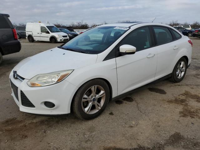 FORD FOCUS SE 2014 with VIN 1FADP3F20EL255783 - Photo from auction