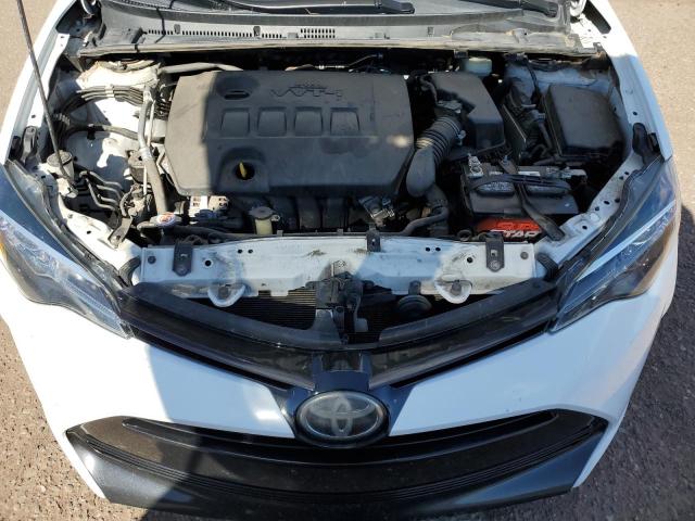 Photo 11 from auction – 2017 TOYOTA COROLLA L with VIN 5YFBURHE3HP690958